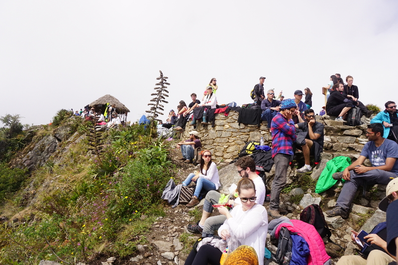 Crowd at Montana Machu Picchu waiting for clouds to clear, Peru